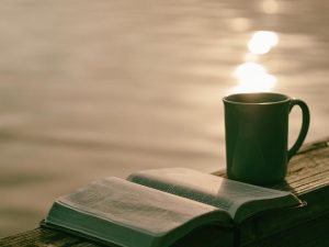 in article about morning pages, journal next to cup of coffee