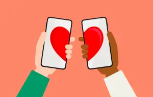 In an article about queer dating apps, an image of two phones with a heart.