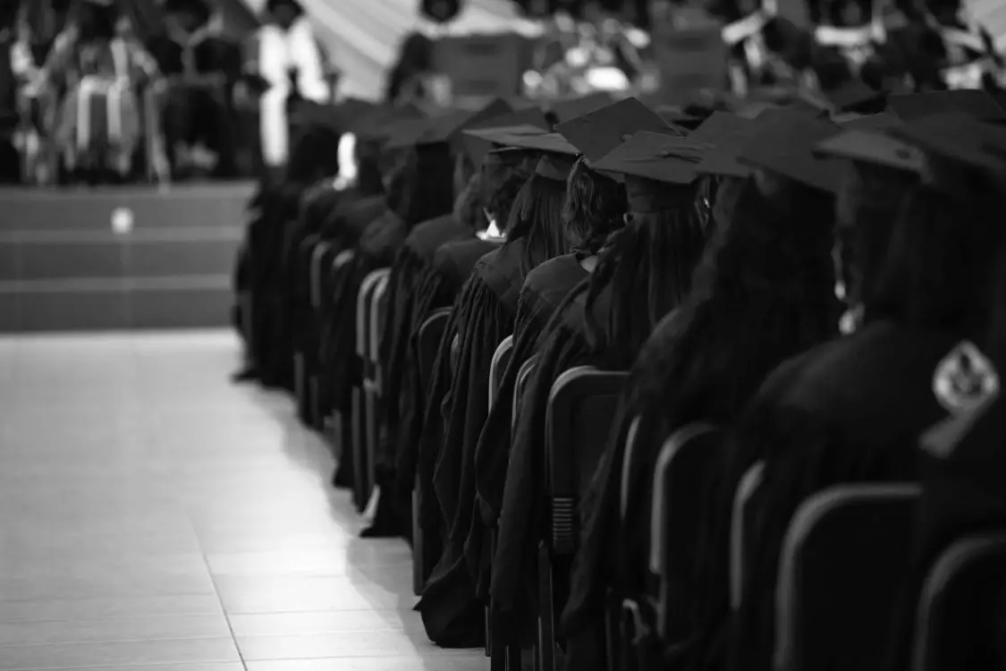 Black and white image of college graduates