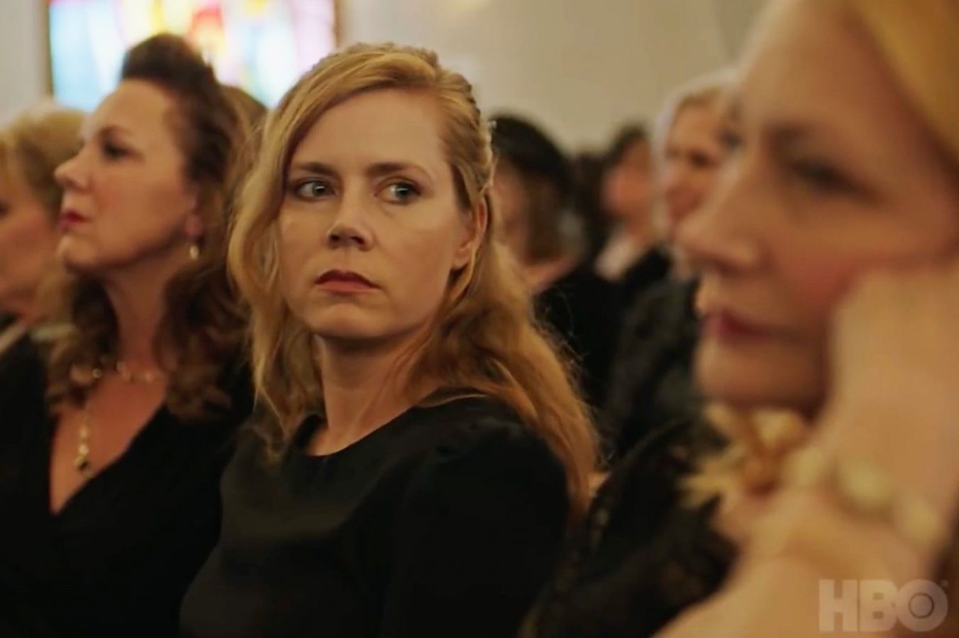 in an article about psychological thriller series, a screenshot from Sharp Objects