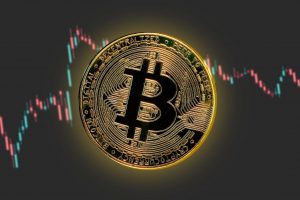 bitcoin token against a line graph