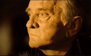 Image of Johnny Cash in his music video for his song Hurt.