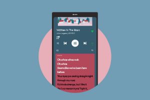 In an aritcle about Spotify's new lyric future, an illustration of a smartphone with the app opened to the lyrics of the song "Written in the Stars"