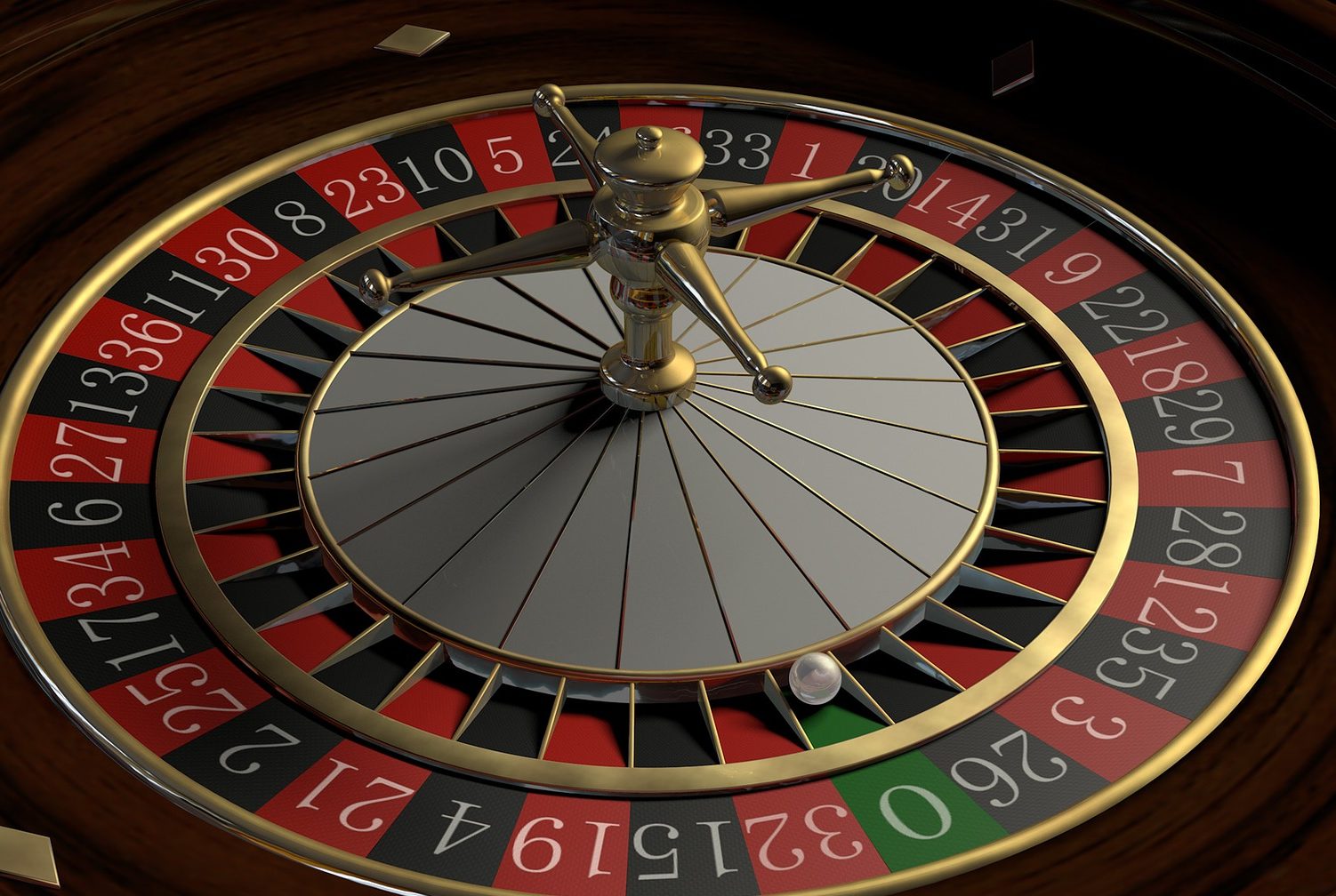 in article about gambling in new zealand, a roulette wheel