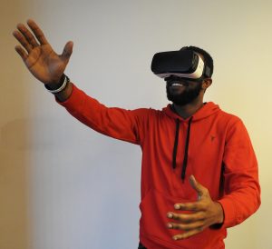 In an article about the VR industry, an image of a man wearing a VR headset.