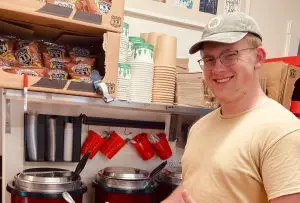 in article about food around james madison university, a photo of the kitchen of grilled cheese mania