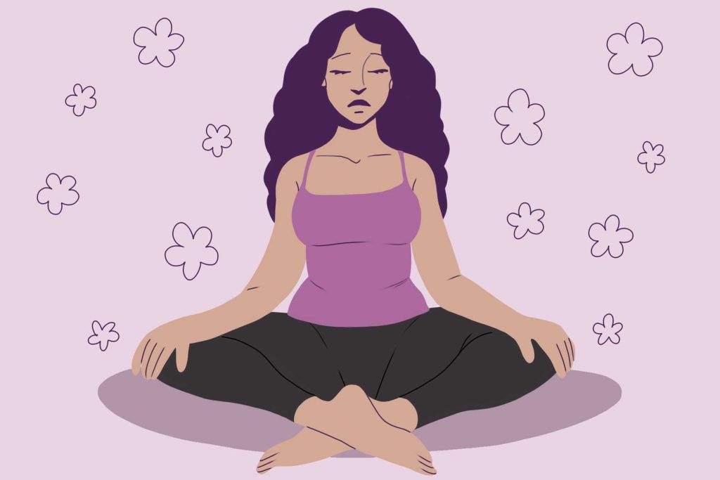 a person practicing trauma-informed yoga