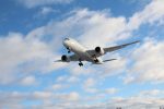 in article about vacations, a photo of an airplane in the sky