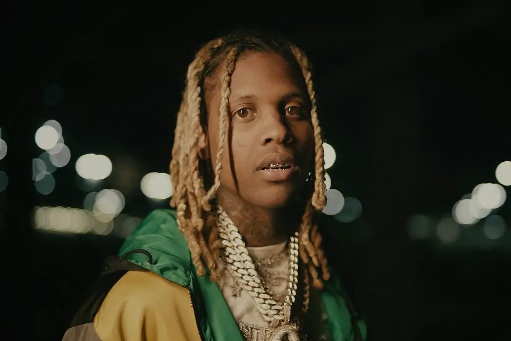 in an article about feuds between rappers, a screenshot of Lil Durk from a music video