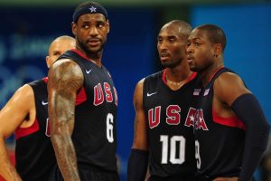 A screenshot from the redeem team documentary shows several members of the team standing in a group