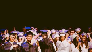 Image of graduates moving their tassels