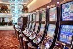 In an article about online casino bonuses a picture of a row of slot machines.