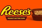 A picture of two Reese’s Peanut Butter Cups stacked on top of one another.