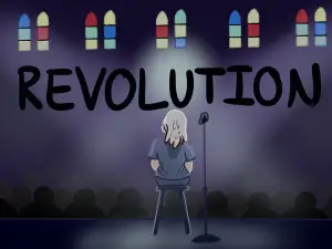 In an article about Chelsea Handler’s recent Netflix special “Revolution,” is an image of Handler on a stage, facing a crowd of people in a dark room.
