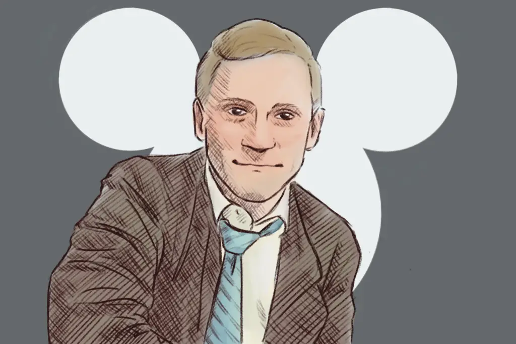 In front of a white silhouette of Mickey Mouse is smiling Howard Ashman, a white man with blond hair who wears a white button down shirt, a blue tie, and a brown jacket.