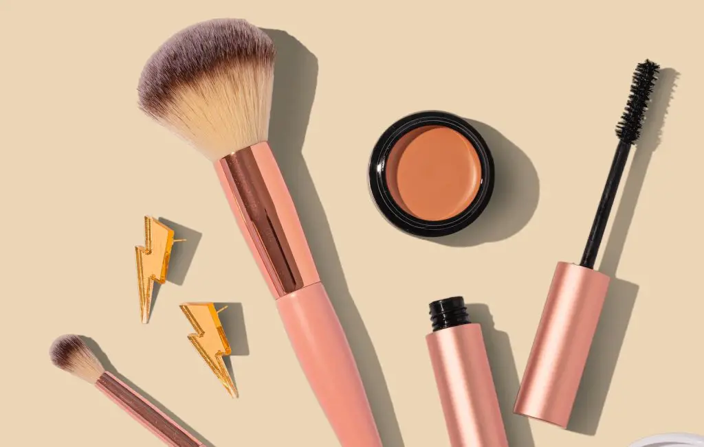 An image with an array of products for someone's makeup routine.