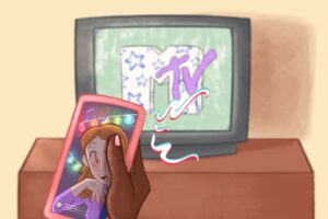 In an article about music video evolution, a TV screen shows the MTV logo while someone sits in front of the TV, scrolling on their phone watching a different video.