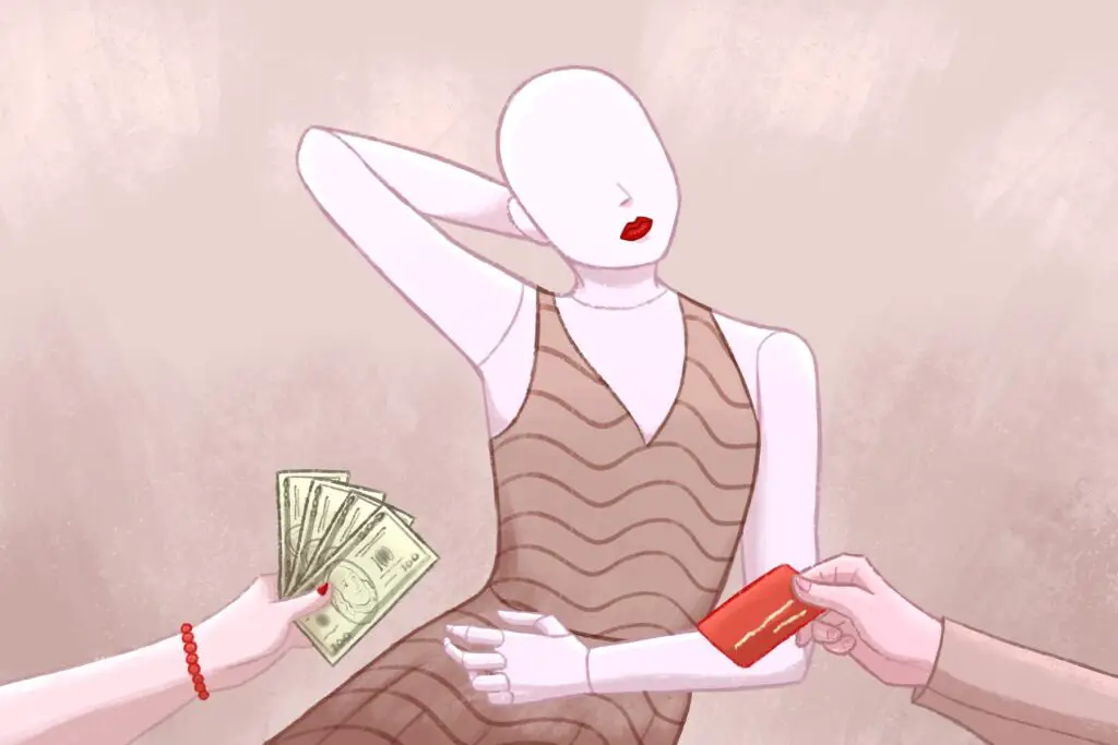 In an article about the ric, white gaze that U.S. Vogue implores, a mannequin with pale skin and red lips stands with one arm behind their head and one arm across their belly. An off-screen figure's hand holds cash while another off-screen figure's hand holds a red credit card.