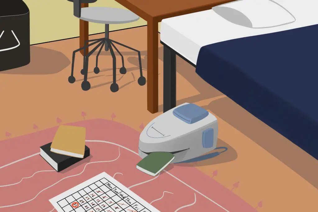 In an article about going back to school as an adult, various school supplies are spread out across the carpet of a small bedroom.