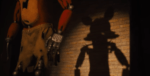 In an article about FNAF, a robotic Freddy casts a grim shadow across a wall.