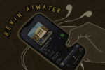 In an article about Kevin Atwater, a user scrolls through Atwater's latest EP on a smart phone connected to earbuds.