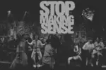 In an article about the Talking Heads concert film, the words "Stop Making Sense" are spelled out in bold across the top. A large stage in black and white is riddled with chracters: two women singing at microphones, a man dancing in front of a microphone, a woman crouched down playing bass and two men playing guitar.