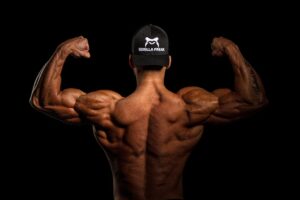 Bodybuilder flexing back muscles