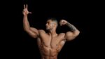 Bodybuilder flexing muscles