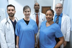 Doctors and nurses standing together.