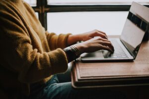 Hands on a keyboard.