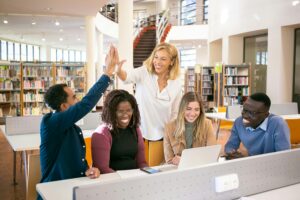 Teacher high five students