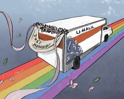 A white U HAUL truck with a red line struck through it and a blue bush drawn on it races across a rainbow, heading to who-knows-where. Pink silk streamers floats off the ends of a pink bouquet placed above a banner with "Just Hitched" written on it in black ink. The streamers flutter in the air against a grey background, implying the speed at which the vehicle must be racing.