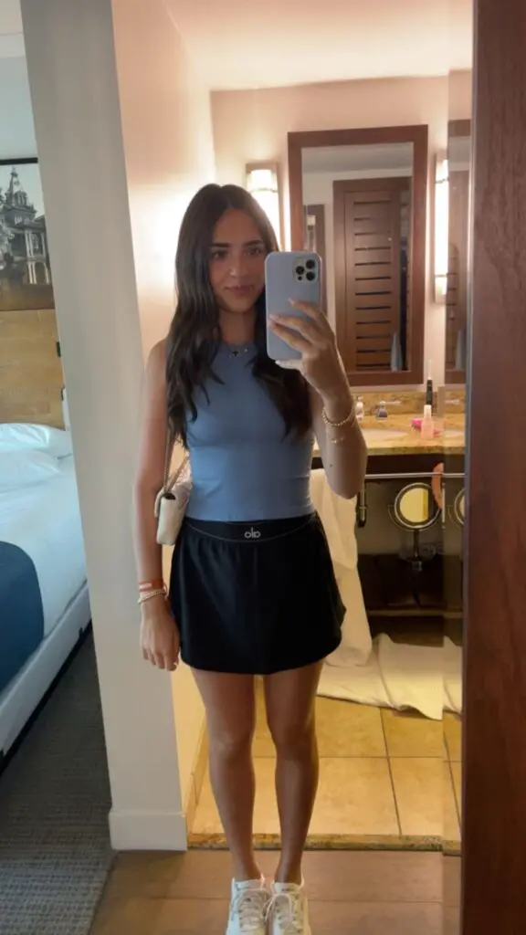 Girl taking mirror selfie 