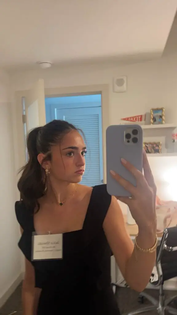 Girl taking mirror selfie 