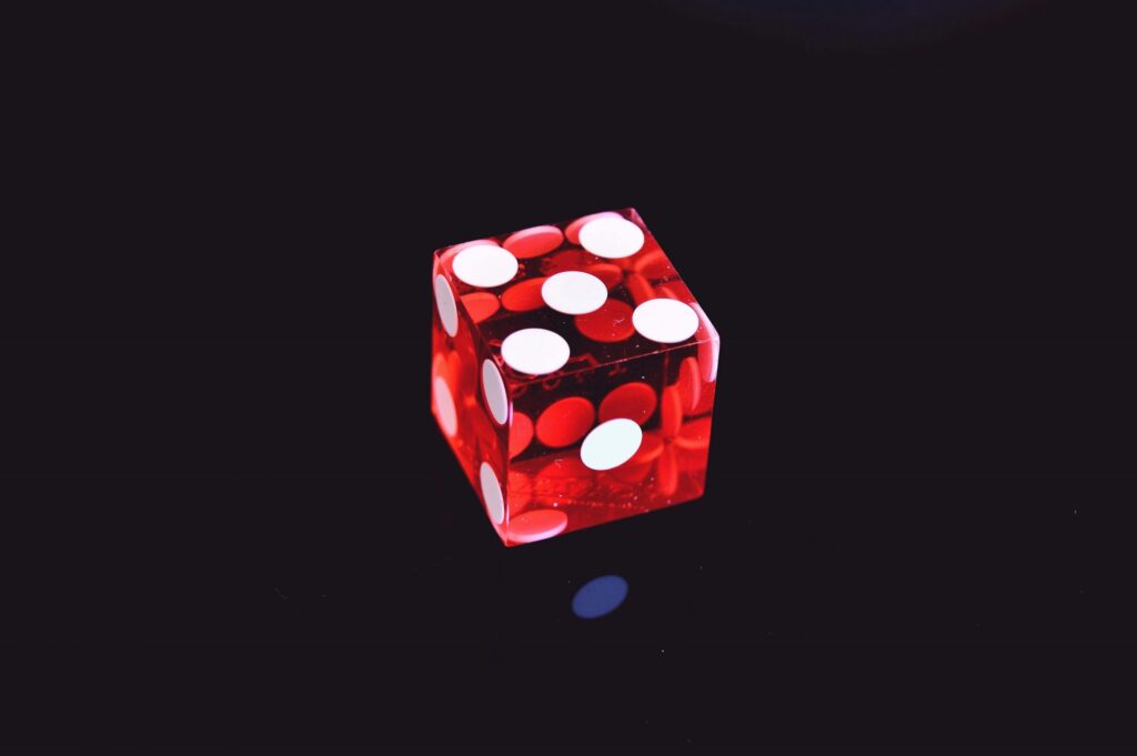 Red dice black background